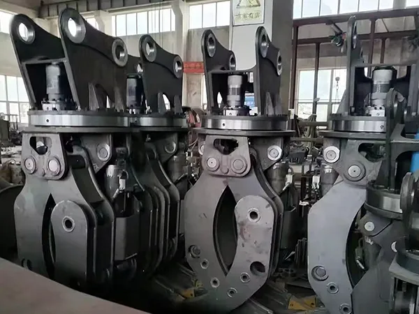 Dual hydraulic cylinders, rotatable, multi-purpose excavator grapple